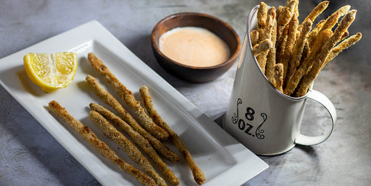 Vegan crispy asparagus with bread crumbs and a dip