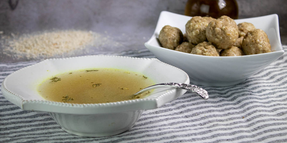 Vegan matzo balls and vegetable soup for passover dinner קניידלך